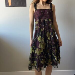 Floral A-Line Midi Dress in Plum Purple sheer overlay with green leaf patterns